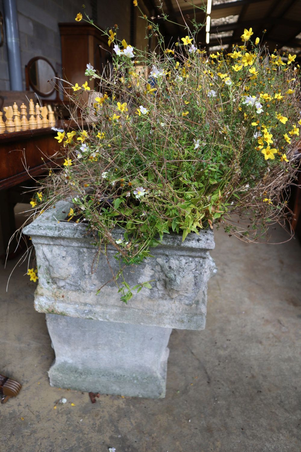 A reconstituted stone rectangular garden planter on trestle stand, length 92cm height 58cm